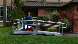 Man going up Pathway 3G Wheelchair Ramp in front of home