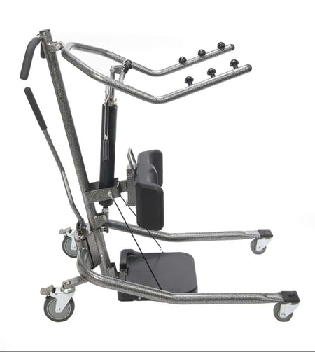 Left side view of the Protekt® 350 Hydraulic Sit-to-Stand Patient Lift, showing cushioned knee supports, footplate, and ergonomic handlebars designed for safe and comfortable patient transfers.
