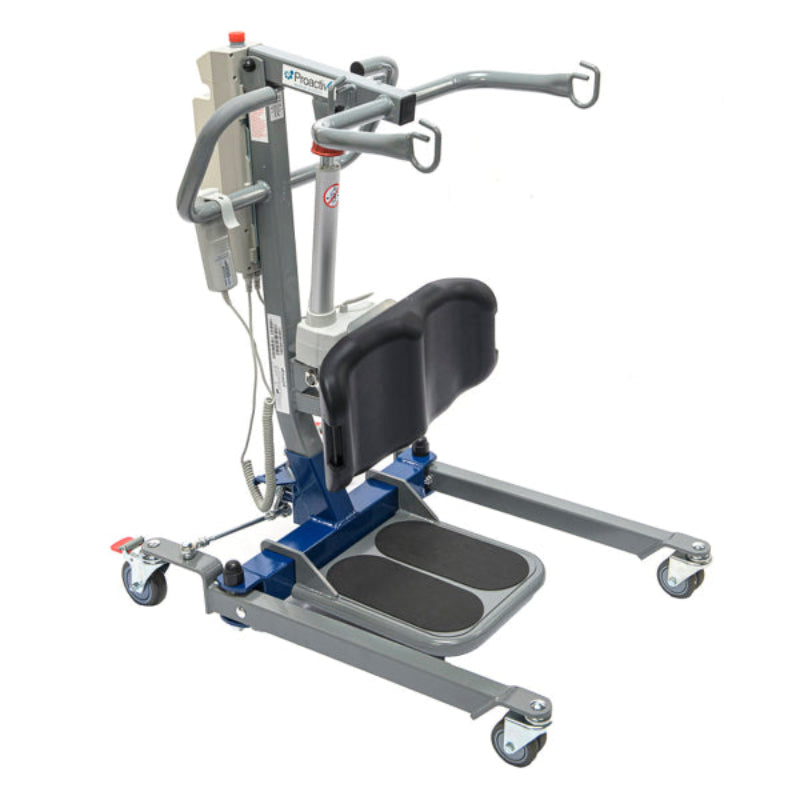 Left 45 degree view of the blue Protekt STS Compact 500 Sit-to-Stand Patient Lift with cushioned knee pad, foot platform, and ergonomic handles – electric medical transfer lift for home or facility use.