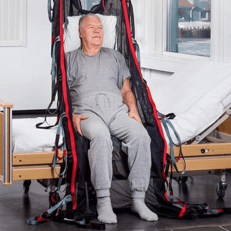 Carer Use Front View - SafeHandlingSheet Positioning Slings By Handicare | Wheelchair Liberty