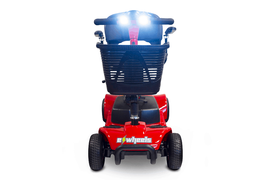 EW-M34 Travel Electric Scooter - Front View With Headlights On - Red - by EWheels Medical | Wheelchair Liberty
