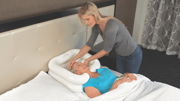 EZ-Access Inflatable Shampoo Basin Person using EZ-Access Inflatable Shampoo Basin for a comfortable wash