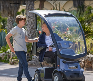 In Use Outdoors - Afiscooter C4 4-Wheel Electric Scooter by Afikim | Wheelchair Liberty