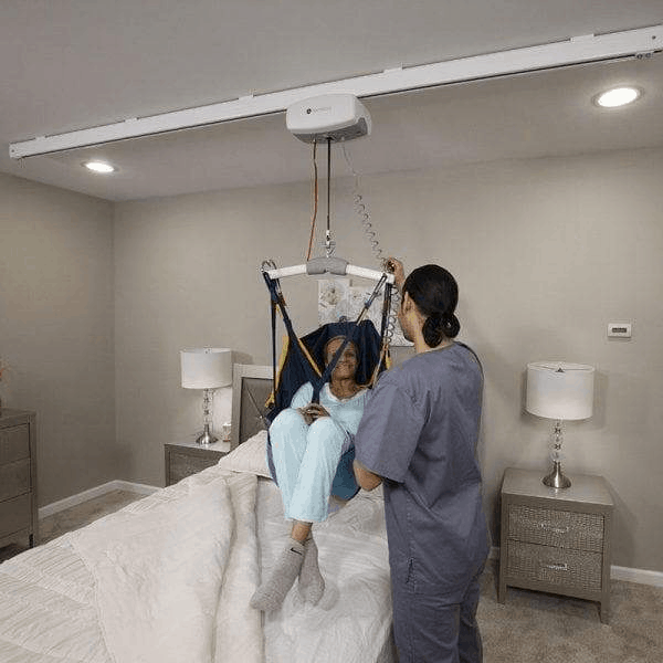 On Bed Lift Caregiver Side - C-450 Fixed Ceiling Patient Lift By Handicare | Wheelchair Liberty