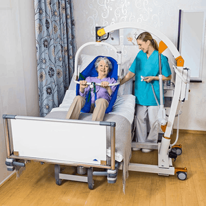 Patient Caregiver - Lift From Bed - Beka CARLO ALU Floor Lift Mobile Lifts By Handicare | Wheelchair Liberty