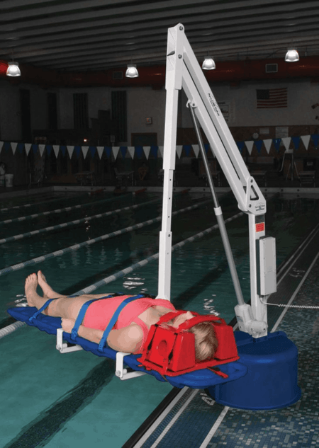 Woman in Stretcher using Revolution Power Pool Lift ADA Compliant by Aqua Creek | Wheelchair Liberty