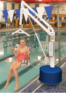 Woman Using the Sling Seat on the Revolution Power Pool Lift ADA Compliant by Aqua Creek | Wheelchair Liberty
