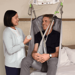 Patient Lifted Using Savaria Hygienic Sling By EZ ACCESS | Wheelchair Liberty