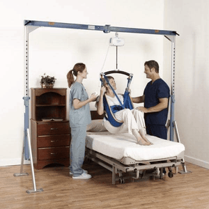 Sling In Use For Bed Lift - Dual Access Sling Hygiene Slings by Handicare | Wheelchair Liberty
