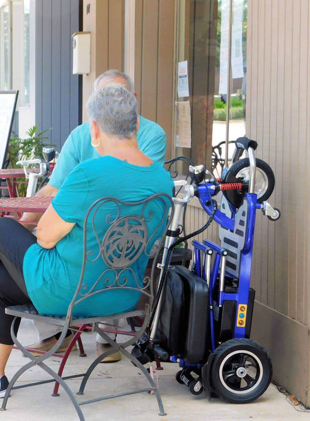 Triaxe CRUZE Scooter - Folded In Use  -  by Enhance Mobility | Wheelchair Liberty