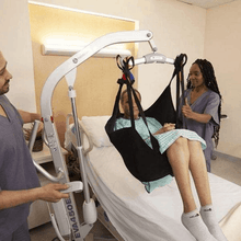 Woman Lifter From Bed - Eva Floor Mobile Patient Lifts By Handicare | Wheelchair Liberty