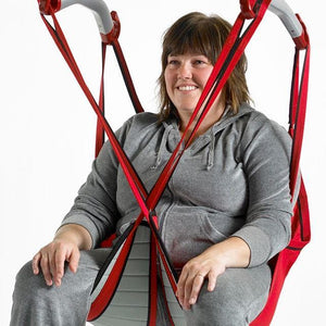 Patient in 4 point Sling Close Up - Molift Partner 255 - Electric Powered Mobile Patient Lift by ETAC - Wheelchair Liberty